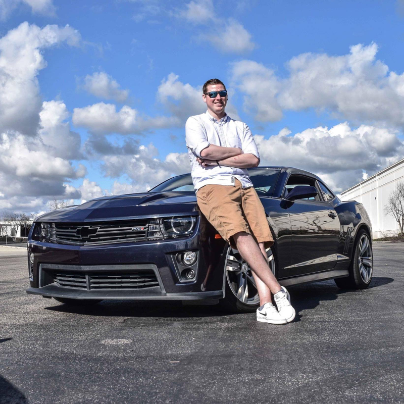 Doss and his 2013 ZL1 in Blue Ray Metallic.